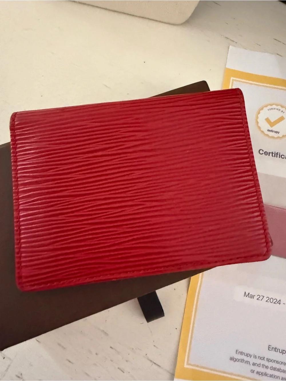Louis Vuitton authenticated great condition red Epi leather credit card
